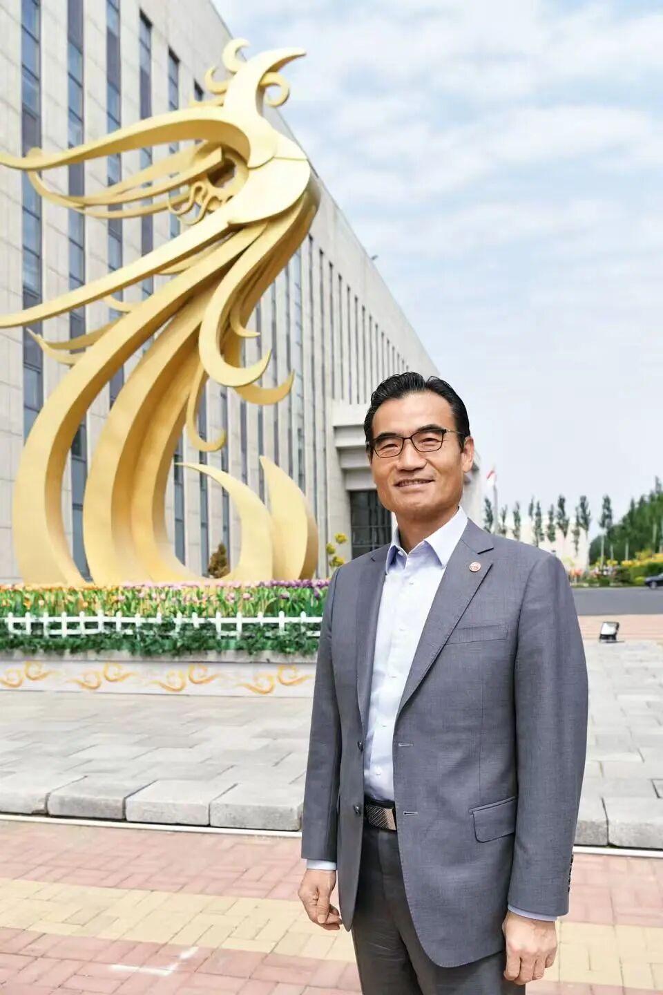 和治友德韩金明：扎根促发展 履职显担当