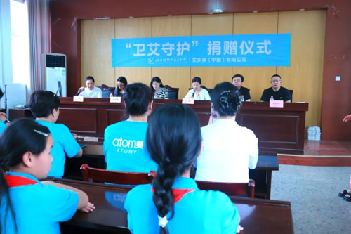 守护暖童心 艾多美公益行走进德清育才学校